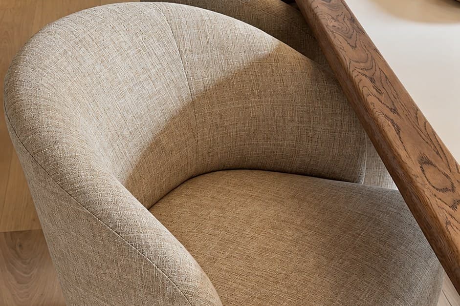 A sculptural bouclé lounge chair